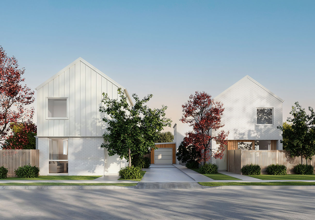 Modern houses with landscaped surroundings.